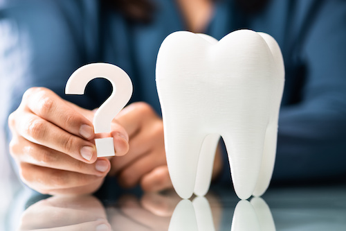 Woman Dental Teeth Question Mark. Dentist FAQs